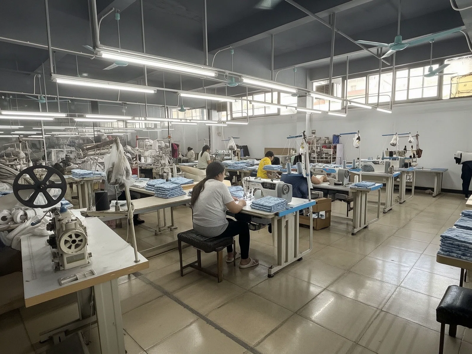 Garment sewing and finishing line on the factory floor